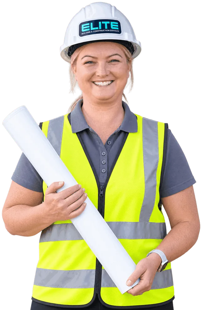 Jamie from Elite in hi-vis holding rolled plans
